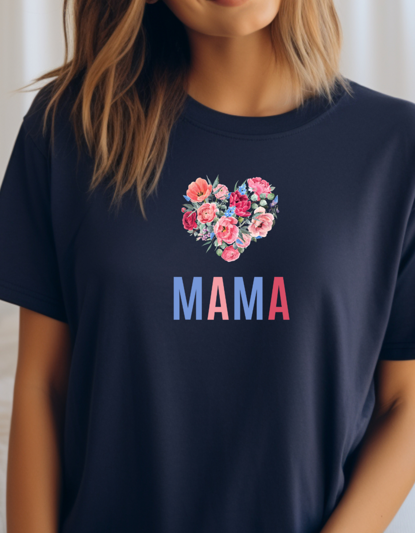 Celebrate Mother's Day with our vibrant "MAMA" t-shirt featuring colorful fonts and a heart-shaped bouquet of flowers. Perfect gift for mom.