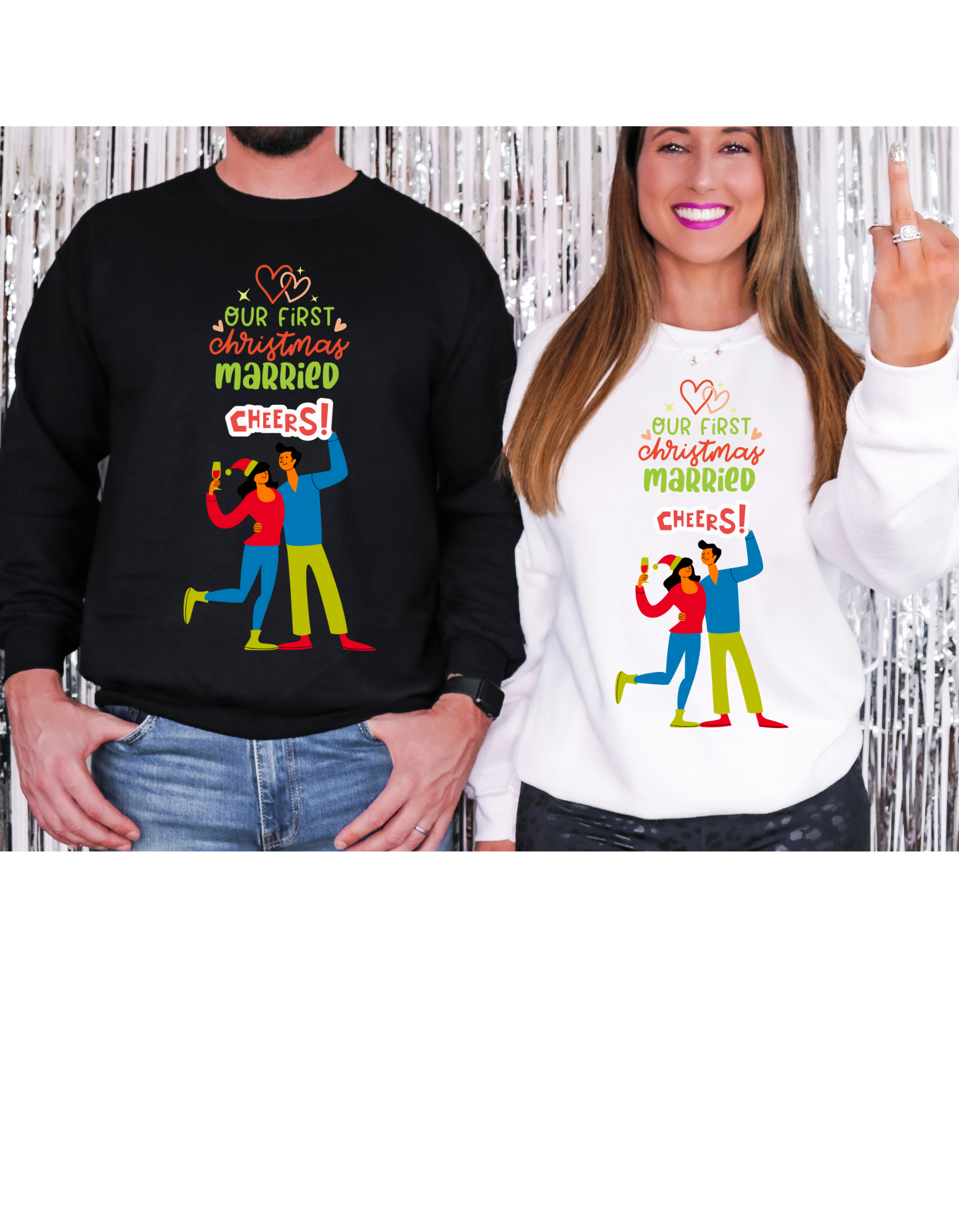 Two people wearing matching sweatshirts with a festive design and text.
